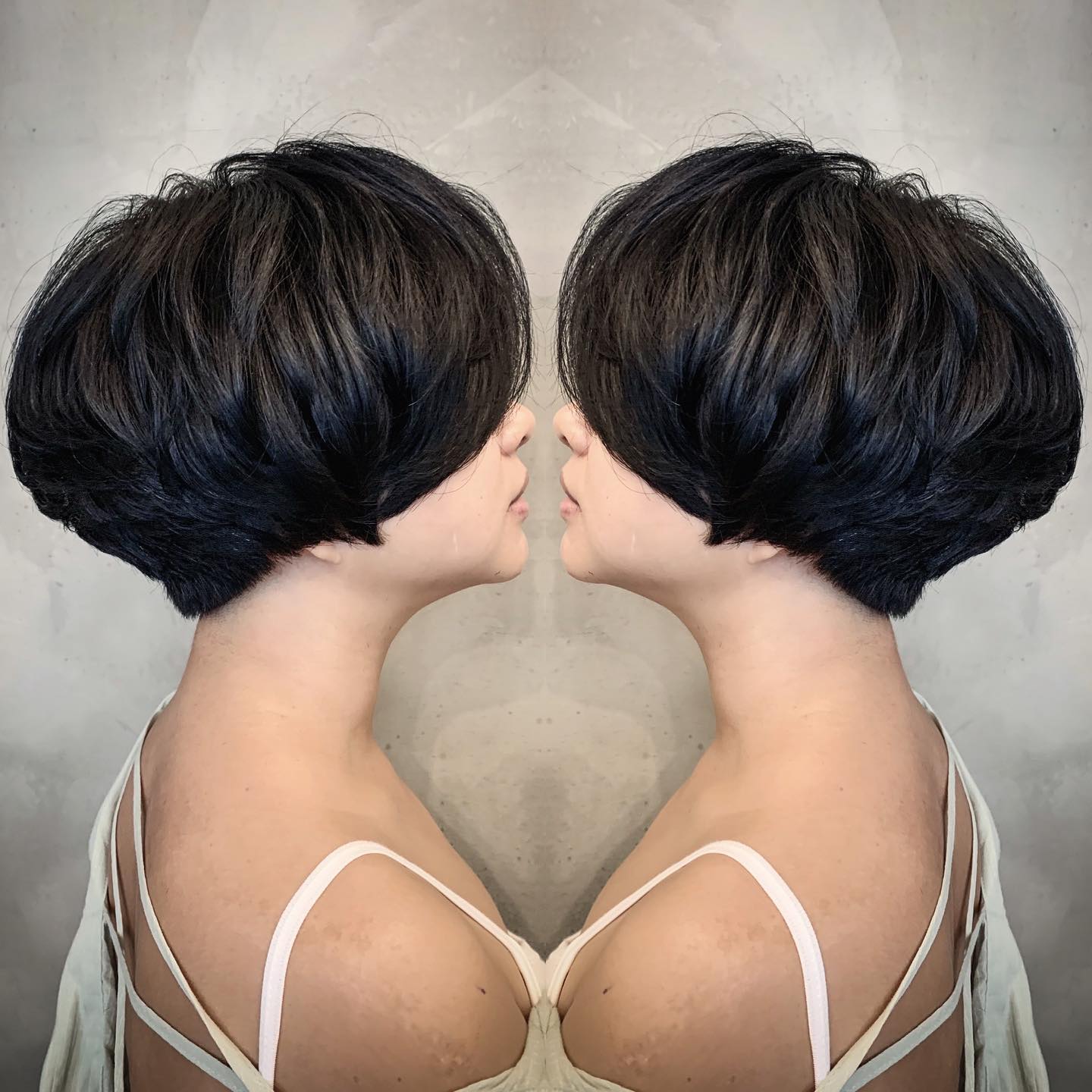 Voluminous Short Layered Hairstyle for Thick Hair