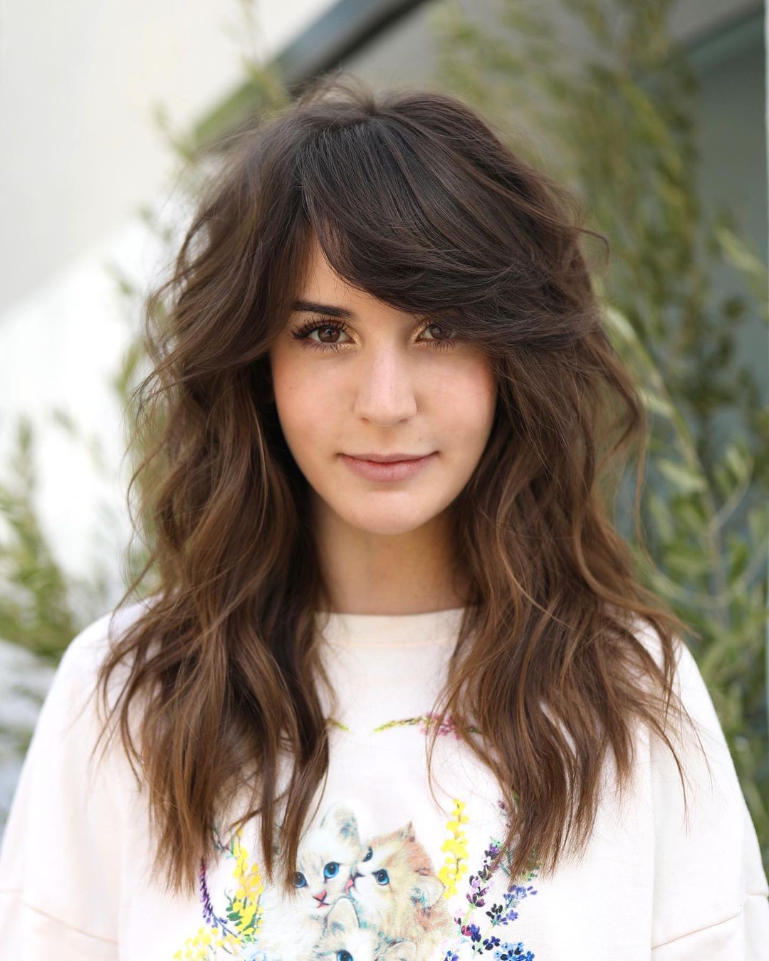 Feathered Side Bangs for Wavy Hair