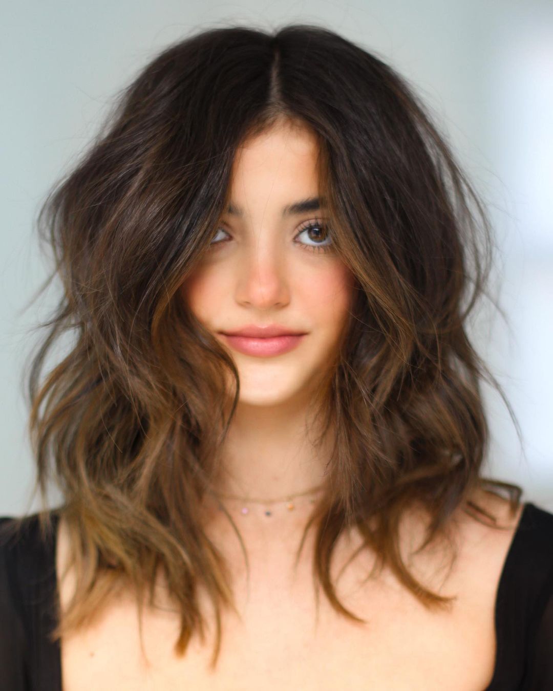 Midi Wavy Layered Hairstyle for Thick Hair