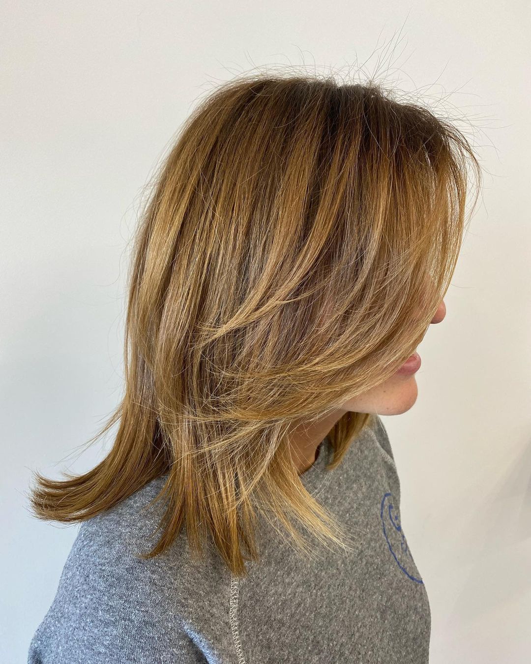 Shoulder-Length Cut with Swoopy Front Layers